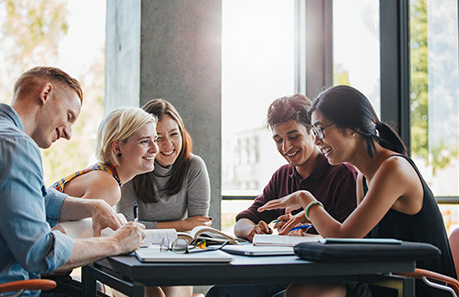 teenagers learning at the table